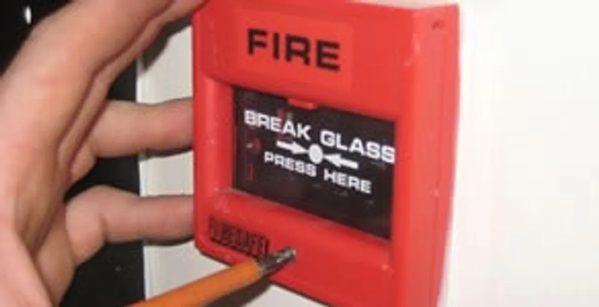 fire alarm installation service showing manual fire alarm pull station installed by licensed electricians in Tampa, FL