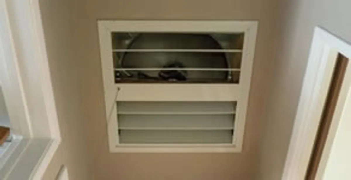 whole house fan installation services with ceiling-mounted ventilation system in Tampa, FL